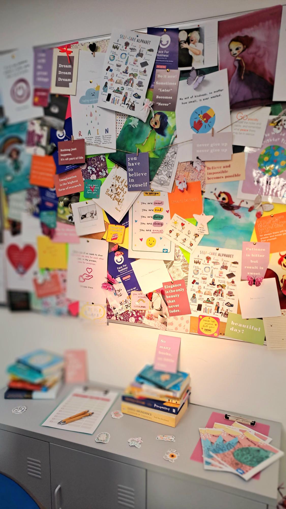 A motivational wall of positive quotes at Face For Business' call answering headquarters