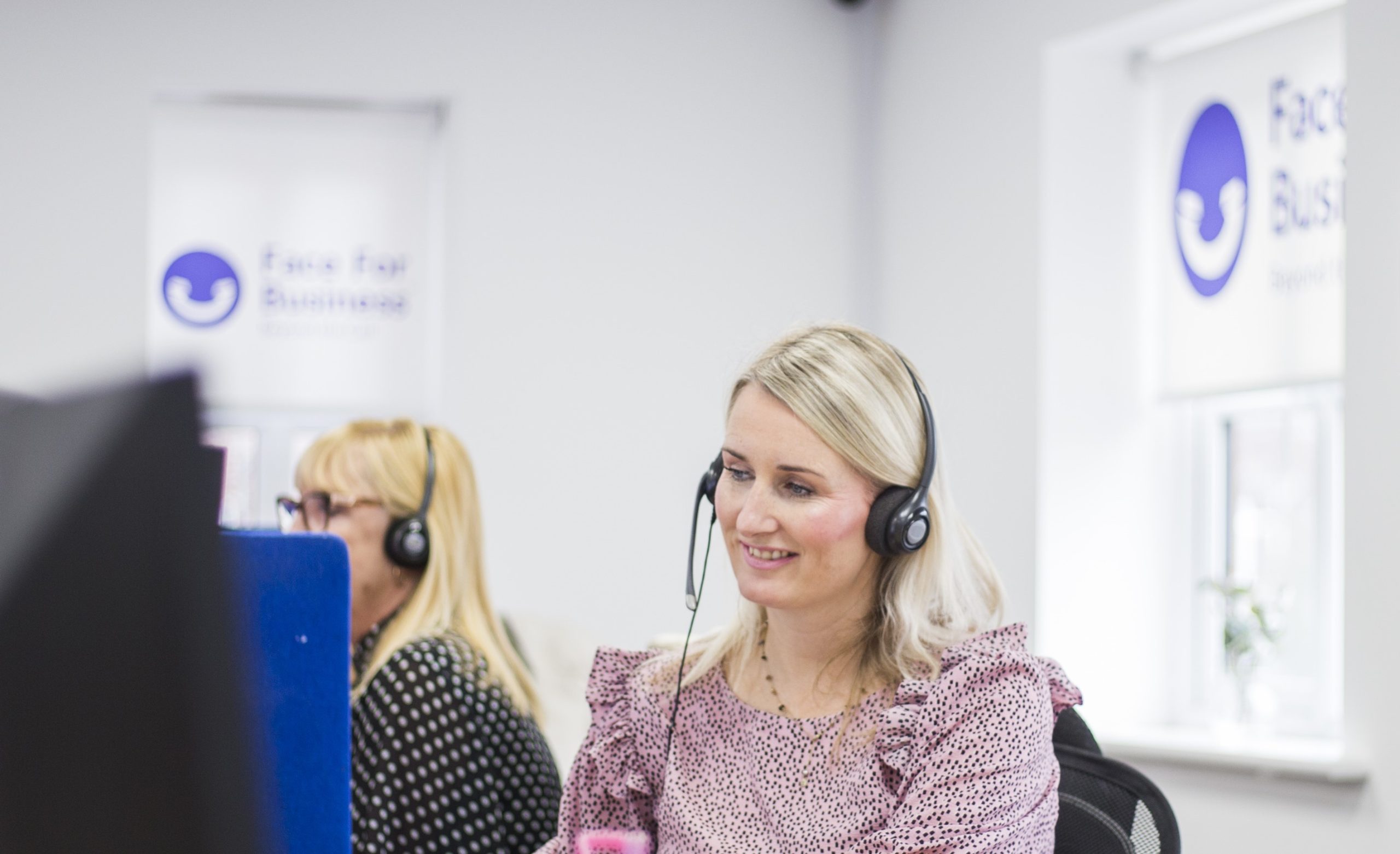 An answering service PA handling a call